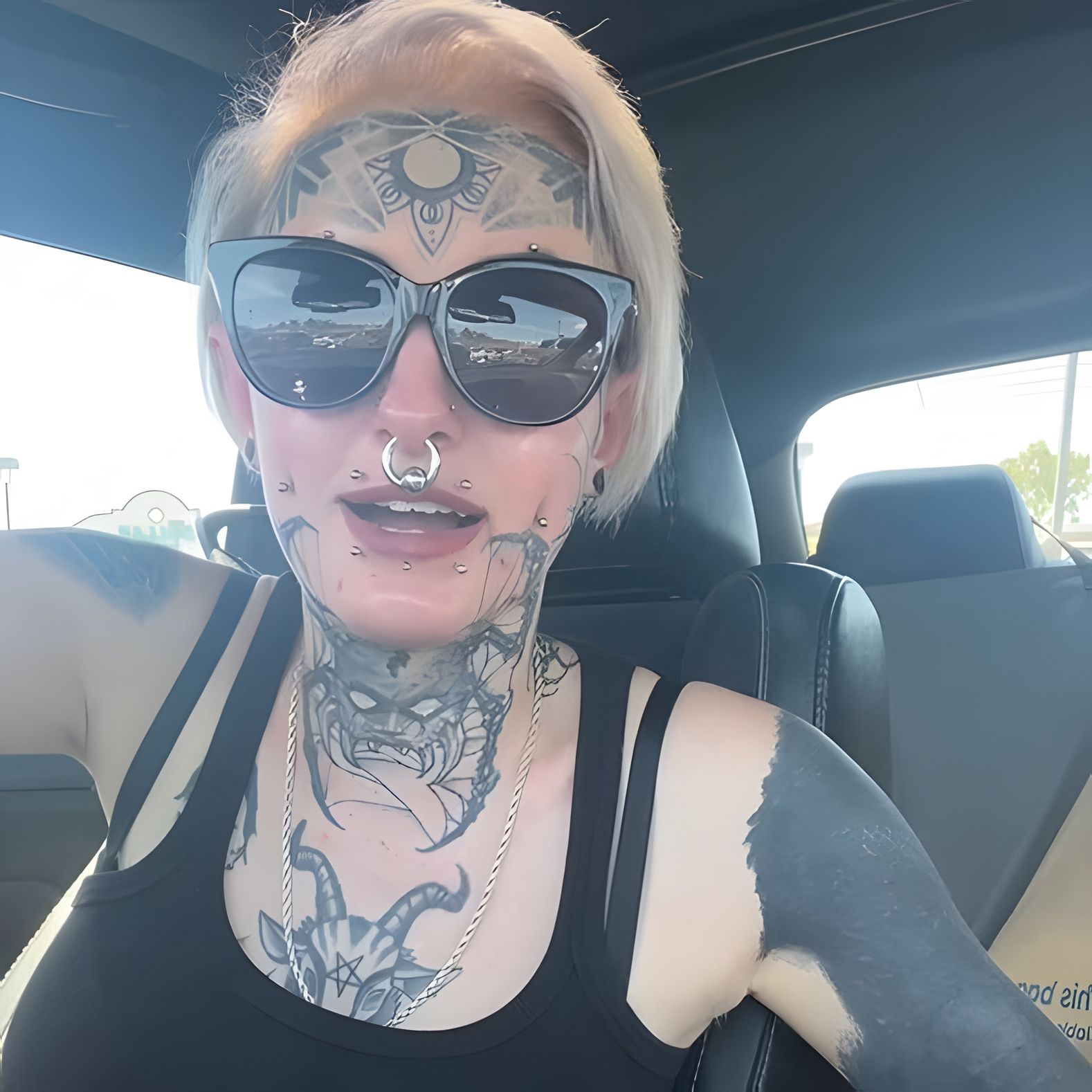Young woman with facial tattoos, piercings confronts TJ Maxx employees after she was denied a job Young woman with facial tattoos, piercings confronts TJ Maxx employees after she was denied a job